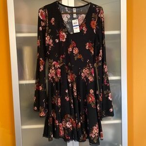 Long bell sleeve black and floral dress.